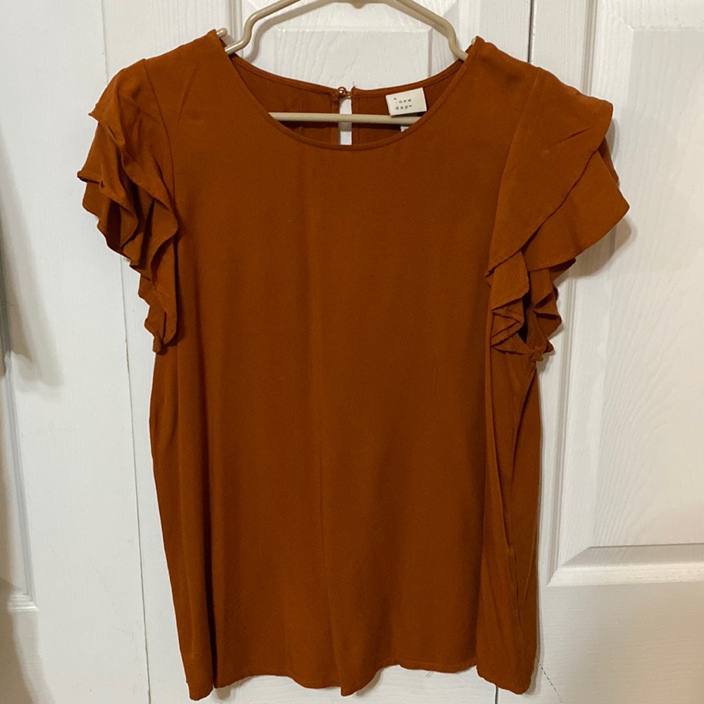 a new day, size Medium, rust colored top